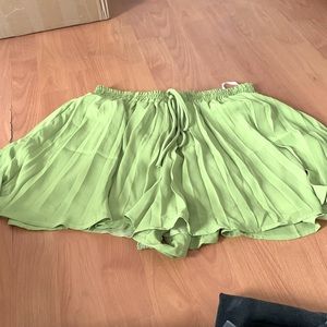green frilly shorts